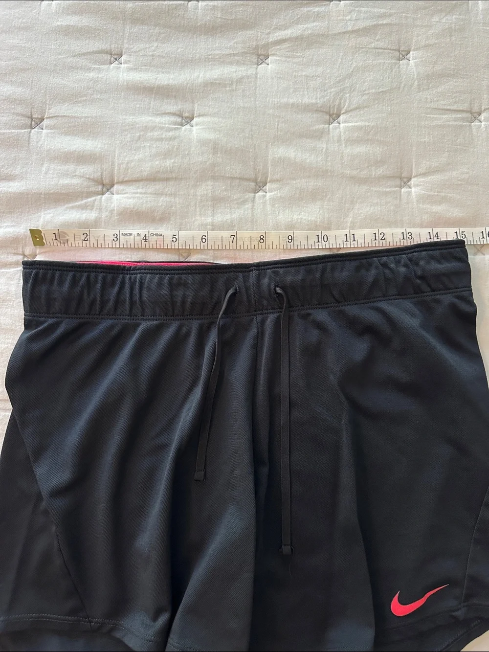 Nike Black Women's Athletic Shorts with Pink Trim
